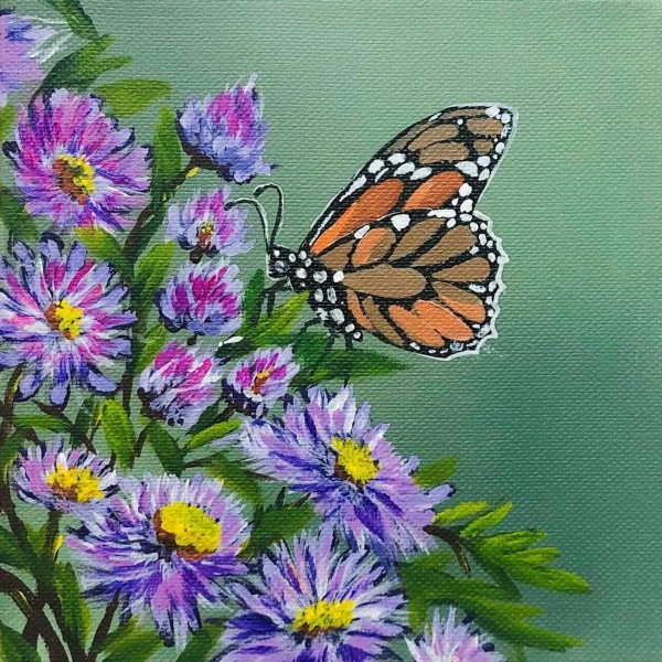 Vlinder op paarse bloemen