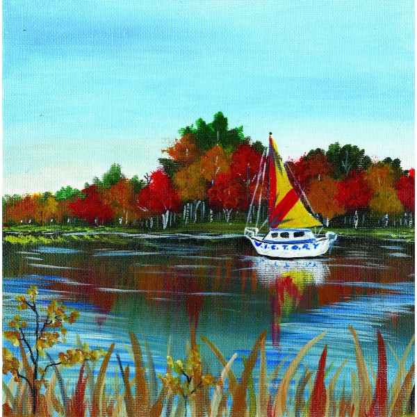 Boot op een meer in de herfst