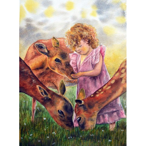 Klein meisje voedert herten